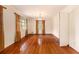 Inviting dining room featuring hardwood floors, ample natural light, and an elegant chandelier at 894 Nottingham Dr, Avondale Estates, GA 30002