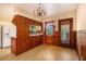 Traditional kitchen featuring tile floor and wood paneling at 894 Nottingham Dr, Avondale Estates, GA 30002