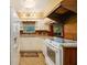 Functional kitchen featuring granite counters, white cabinetry, and appliances at 894 Nottingham Dr, Avondale Estates, GA 30002