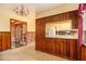 Efficient kitchen with charming wood accents and tile flooring at 894 Nottingham Dr, Avondale Estates, GA 30002