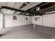 Unfinished basement with concrete floor, painted walls, and exposed ceiling at 1041 Standard Ne Dr, Brookhaven, GA 30319