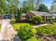 Attractive brick home with well-maintained lawn, detached garage, and charming curb appeal at 1041 Standard Ne Dr, Brookhaven, GA 30319