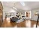 Bright living room featuring high ceilings, skylights, hardwood floors, and a fireplace at 1041 Standard Ne Dr, Brookhaven, GA 30319