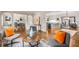 Inviting living room with hardwood floors, stylish seating, and an open layout to the dining area at 1041 Standard Ne Dr, Brookhaven, GA 30319