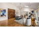 Spacious living room with high ceilings, skylights, hardwood floors, a fireplace, and a large sliding barn door at 1041 Standard Ne Dr, Brookhaven, GA 30319