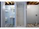 Simple bathroom includes a pedestal sink, shower stall, and toilet at 128 Reynolds Bridge Rd, Kingston, GA 30145
