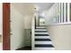 View of the entryway with a staircase leading to the upper level at 128 Reynolds Bridge Rd, Kingston, GA 30145