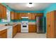Bright kitchen featuring ample cabinet space and stainless steel refrigerator at 128 Reynolds Bridge Rd, Kingston, GA 30145