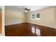 Spacious living room featuring hardwood floors and natural light from large windows at 128 Reynolds Bridge Rd, Kingston, GA 30145