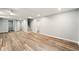 Finished basement area with updated flooring, recessed lights, and multiple rooms at 163 Oakcliff Ct, South Fulton, GA 30331