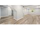 Finished basement with luxury vinyl plank flooring, neutral paint, recessed lights and a window at 163 Oakcliff Ct, South Fulton, GA 30331