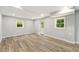 Finished basement provides extra living space with a door to the outside and large windows at 163 Oakcliff Ct, South Fulton, GA 30331