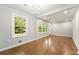 Hardwood floors, stylish lighting, and an open feel define this lovely living space at 163 Oakcliff Ct, South Fulton, GA 30331