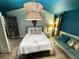 Cozy bedroom with stylish decor, unique lighting and comfortable furniture at 23 Gould Se St, Atlanta, GA 30315