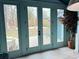 View of the living room featuring glass doors that lead outside to the backyard at 23 Gould Se St, Atlanta, GA 30315