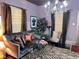 Cozy living room featuring hardwood floors, comfortable seating, and elegant decor, perfect for relaxation and entertaining guests at 23 Gould Se St, Atlanta, GA 30315