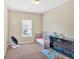 Well-lit bedroom with modern dresser, day bed, and plush carpet at 635 Oakside Pl, Acworth, GA 30102