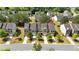 Charming townhome with a well-manicured lawn and mature trees offering curb appeal at 635 Oakside Pl, Acworth, GA 30102