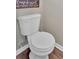 Close-up of a clean, white toilet in a well-maintained bathroom at 635 Oakside Pl, Acworth, GA 30102