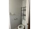 Powder bathroom featuring a toilet and shelving at 6354 Shannon Pkwy # 13C, Union City, GA 30291