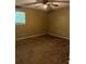Neutral bedroom with a window and ceiling fan at 6354 Shannon Pkwy # 13C, Union City, GA 30291