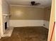 Living room featuring a fireplace and ceiling fan at 6354 Shannon Pkwy # 13C, Union City, GA 30291