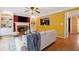 Inviting living room featuring a fireplace, built-in shelving, and hardwood floors at 1300 Sever Woods Dr, Lawrenceville, GA 30043
