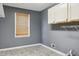 Clean room with gray walls, gray floors, and natural light at 1300 Sever Woods Dr, Lawrenceville, GA 30043