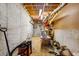Unfinished basement features concrete walls and floor, and exposed utilities at 1300 Sever Woods Dr, Lawrenceville, GA 30043