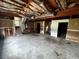 Unfinished basement with exposed beams and concrete floors at 1504 Colt Ridge Se Ln, Mableton, GA 30126