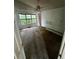 Bedroom with ceiling fan and large window view at 1504 Colt Ridge Se Ln, Mableton, GA 30126