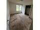 An empty bedroom with a closet and window at 1504 Colt Ridge Se Ln, Mableton, GA 30126