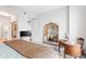 Bedroom with large mirror, vintage writing desk, and a view of the doorway to the bathroom at 2795 Peachtree Ne Rd # 2101, Atlanta, GA 30305