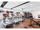 Spacious gym featuring treadmills, weights, machines, and mounted TVs at 2795 Peachtree Ne Rd # 2101, Atlanta, GA 30305