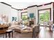 Living room with fireplace, large windows offering bright light, and comfortable seating at 2795 Peachtree Ne Rd # 2101, Atlanta, GA 30305