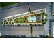Aerial view showcasing a community with a pool, manicured green spaces, and well-maintained buildings at 3481 Landen Pine Ne Ct, Atlanta, GA 30305
