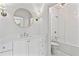 Stylish bathroom featuring a modern vanity with round mirror, updated fixtures, and shower-over-tub at 3481 Landen Pine Ne Ct, Atlanta, GA 30305