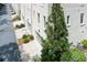 Townhome complex with tree-lined streets, landscaped grounds, garages and private entrances at 3481 Landen Pine Ne Ct, Atlanta, GA 30305