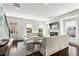 Spacious living room with fireplace, staircase, large windows, and comfortable seating, perfect for entertaining at 3481 Landen Pine Ne Ct, Atlanta, GA 30305