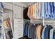 Organized walk-in closet featuring custom shelving, drawers, and ample hanging space for clothes and accessories at 3481 Landen Pine Ne Ct, Atlanta, GA 30305