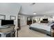 Bedroom featuring an open layout with multiple rooms and closet space and lots of light at 6378 Grey Fox Way, Riverdale, GA 30296