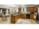 Functional kitchen showcasing ample counter space, stainless appliances, and plenty of light at 6378 Grey Fox Way, Riverdale, GA 30296