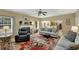 Inviting living room with fireplace, plush seating, and natural light at 6378 Grey Fox Way, Riverdale, GA 30296