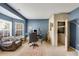 Home office with natural light, a recording booth, and ample workspace at 6378 Grey Fox Way, Riverdale, GA 30296