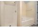 Bathroom featuring a tub-shower combo at 115 Manx Dr, Grantville, GA 30220