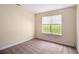 Carpeted bedroom with a window view at 115 Manx Dr, Grantville, GA 30220