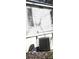 A view of the siding and an external AC unit that cools the home at 7301 Staton Se Pl, Acworth, GA 30102