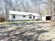 Quaint single story home with front porch and a detached storage shed at 7301 Staton Se Pl, Acworth, GA 30102