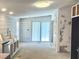 Spacious kitchen area featuring elegant white cabinets, stainless steel appliances, and stylish fixtures at 7301 Staton Se Pl, Acworth, GA 30102