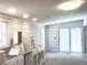 Well-lit kitchen featuring new stainless steel appliances, ample counter space, and modern lighting at 7301 Staton Se Pl, Acworth, GA 30102